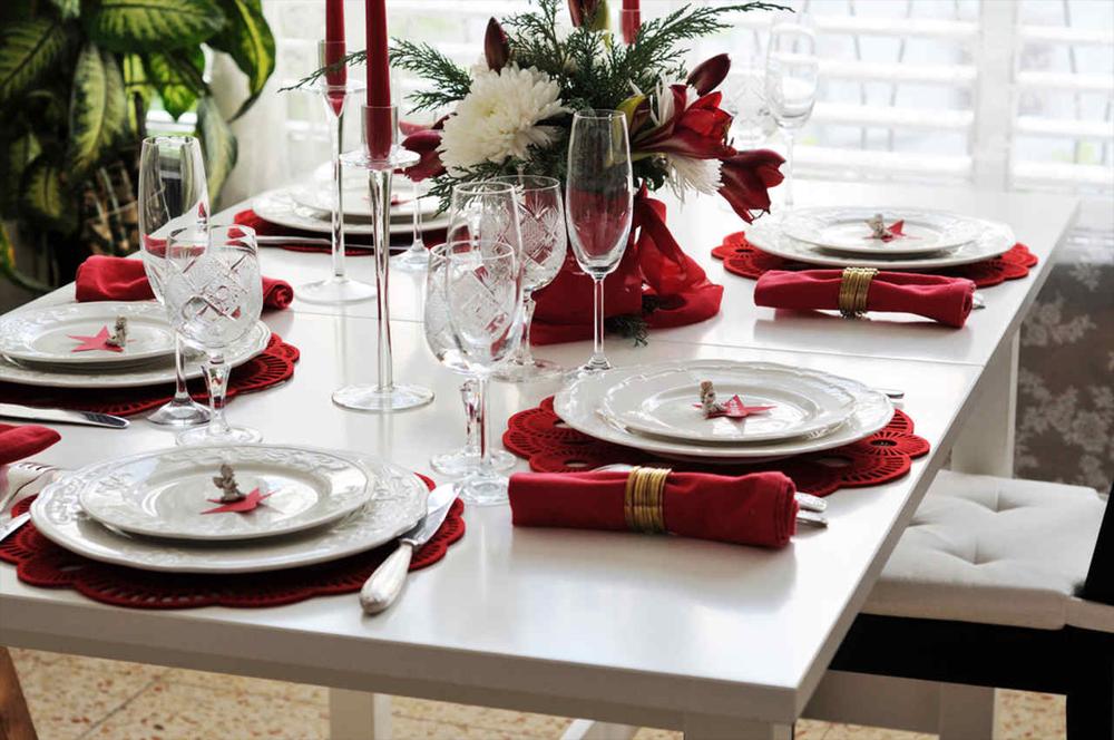 white and red colored christmas dining table decor