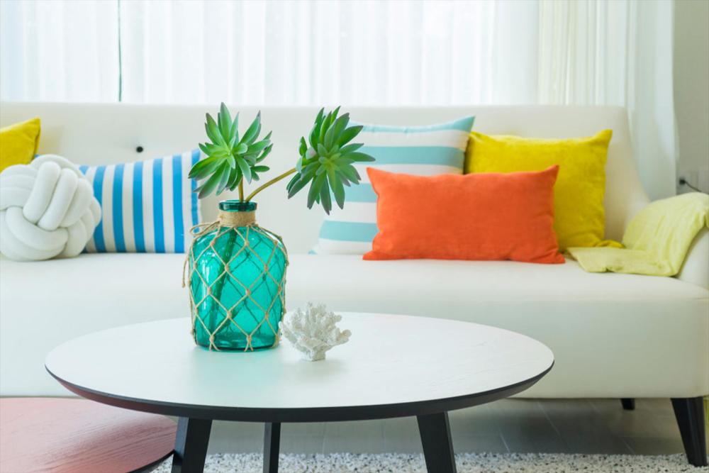 colorful cushions on top of sofa