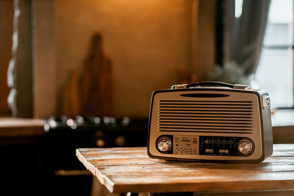 old radio on wooden table