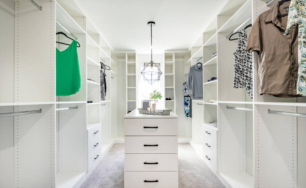 walk in closet designed in white color